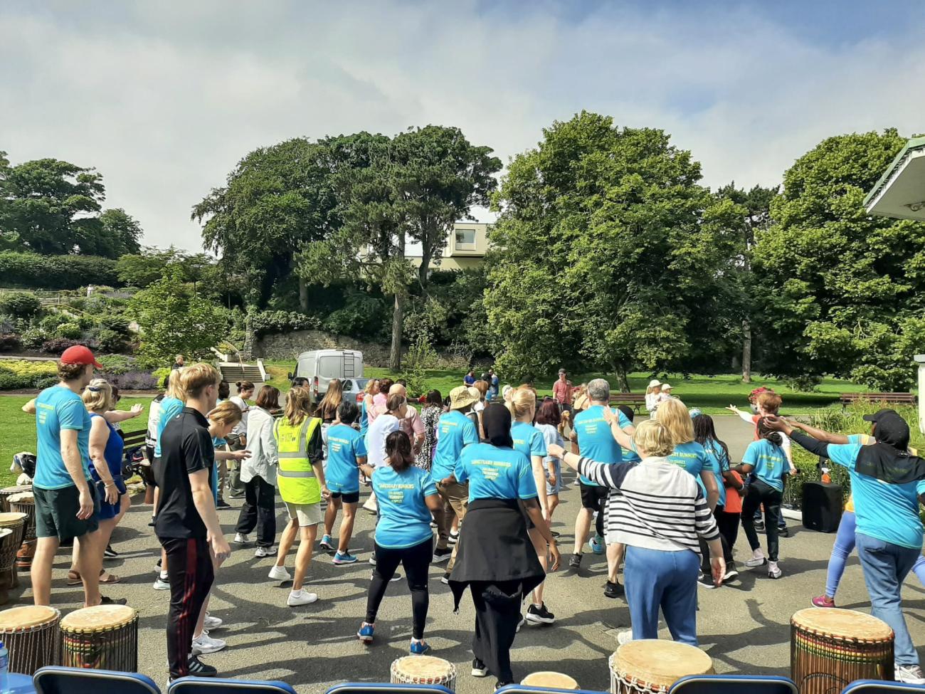 A group of people warming up for a run