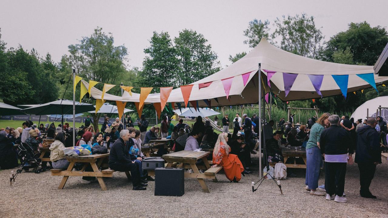 A group of people enjoying an outdoor event